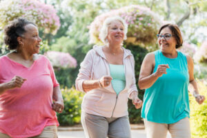 A Group Of Seniors Jogging Outdoors